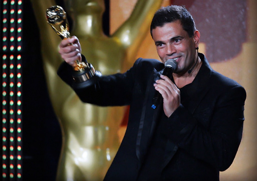 Egyptian singer Amr Diab performing on stage